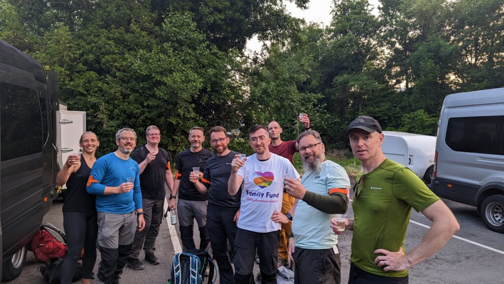 Matt and his team enjoying a well earned drink after completing the National Three Peaks challenge.