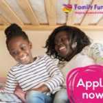 Mum and daughter smile as they look at a tablet on the bed. The Family Fund logo is on the top right corner.  A text reads 'Apply now'