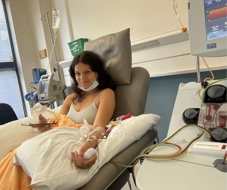 Leroy's sister Roma, aged 17, lies in a hospital bed as she donates her stem cells to help treat her brother.