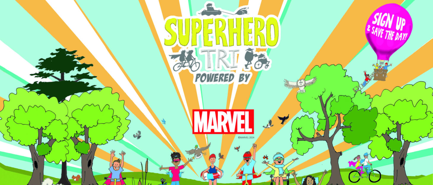 A group of cartoon children standing by a lake in superhero costumes. The text above them reads 'Superhero tri powered by Marvel.' There is a hot air balloon in the corner with the words 'Sign up and save the day' written on it.