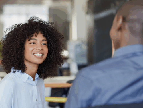 Two adults chatting to each other