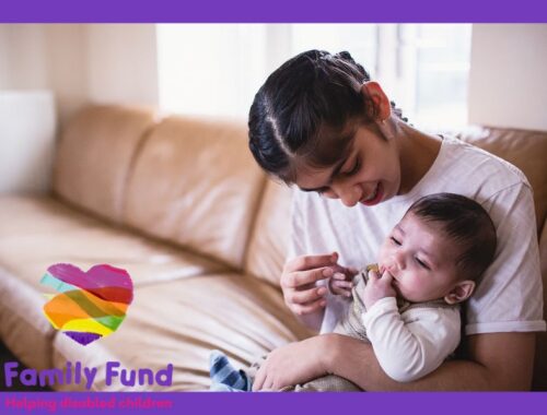 Girl cares for baby brother on couch