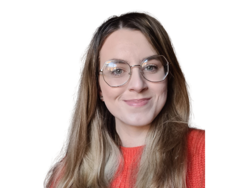 A young woman with large glasses and long hair